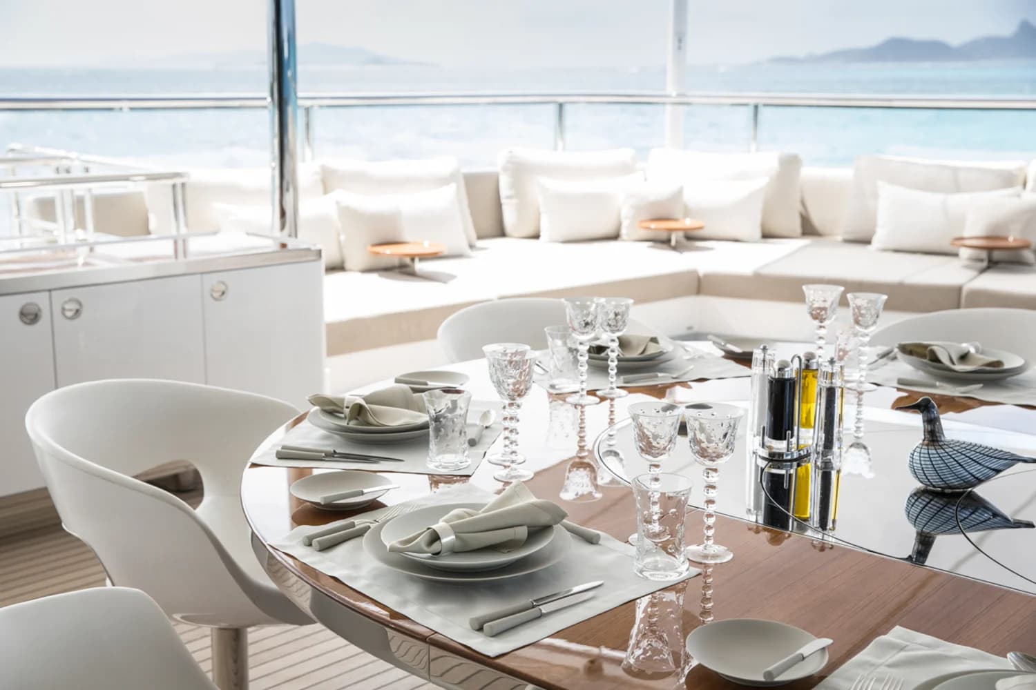 A High Thread Count Luxury Bedding Set With Gold Embroidery And A Yellow Cashmere Throw